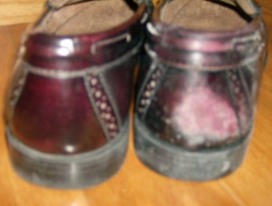 Burgundy Men's Loafer with scuff mark on right schoe from driving 